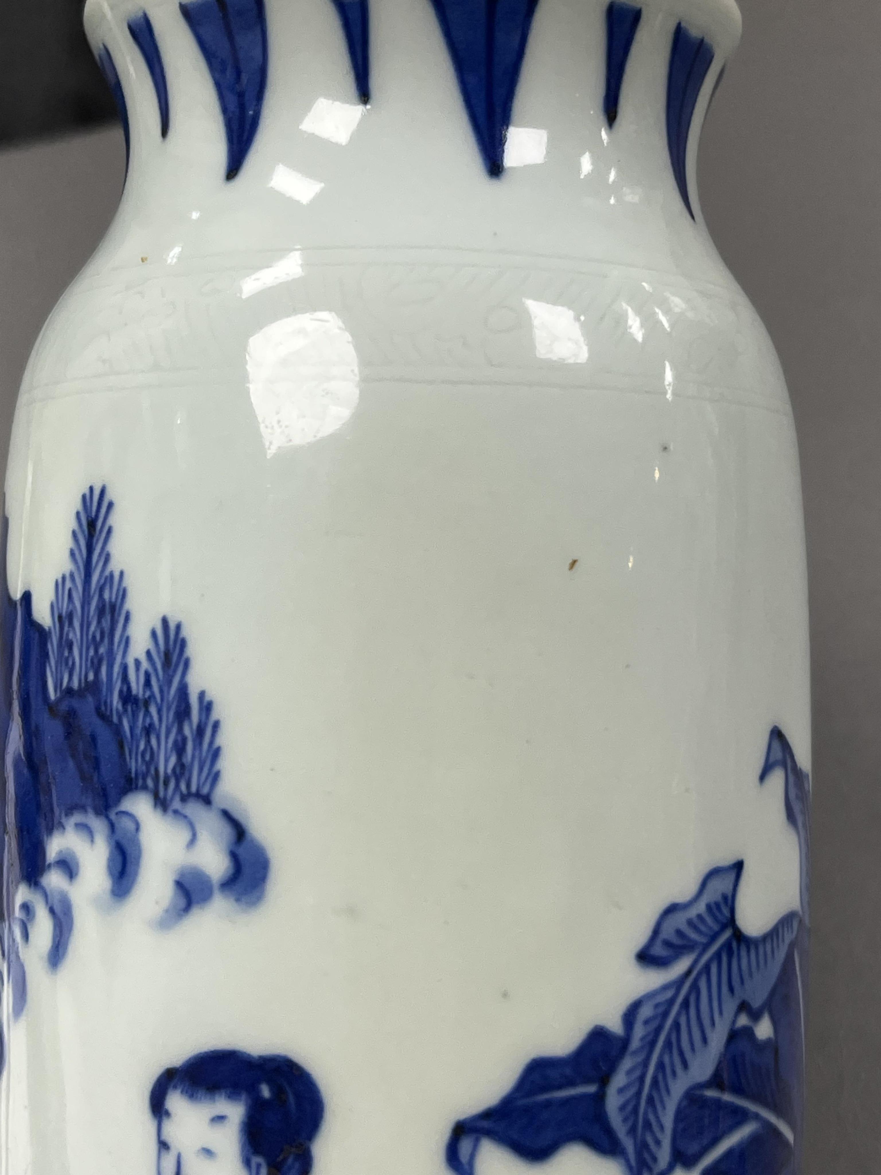 A small Chinese blue and white ‘figures in garden’ rolwagen vase, possibly Chongzhen period (1627-1644)